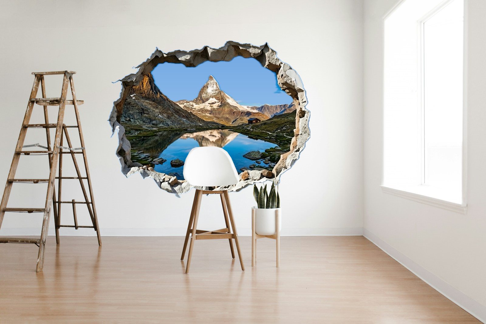 Simulation : grand trompe-l'œil du Cervin imprimé sur le mur blanc d'un atelier lumineux